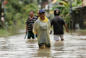 Thailand floods: 12 dead as record rainfall persists